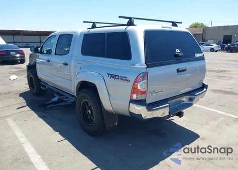 2012 Toyota Tacoma Base V6 z USA, uszkodzony, nr VIN 3TMLU4EN1CM087213